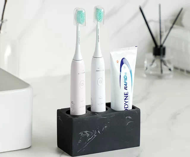 How to brush with electric toothbrush?