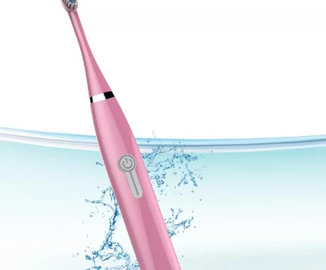 What is the correct way to brush with Oral B electric toothbrush?